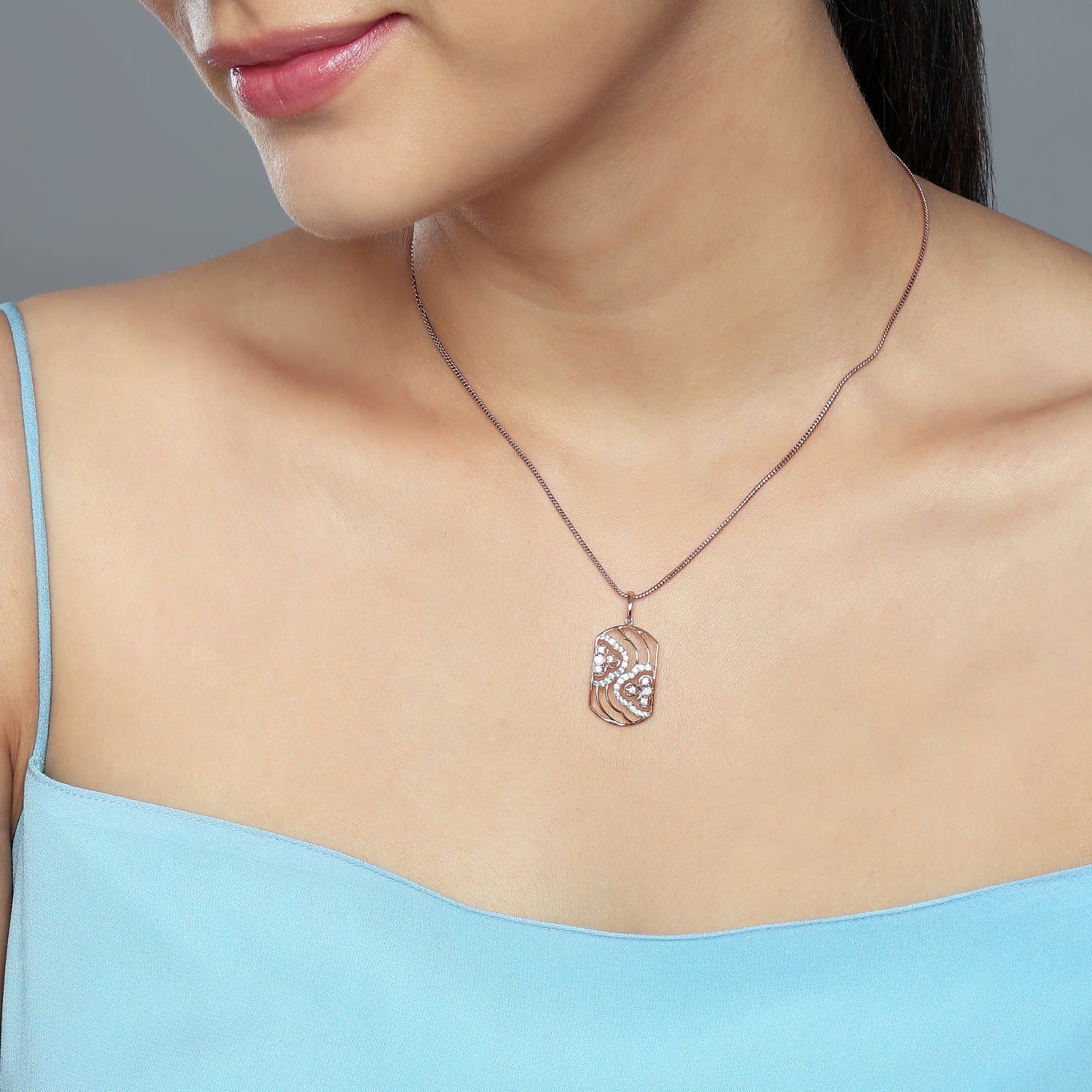 Artful Dual Swirl Pendant With Contemporary Statement Elegance