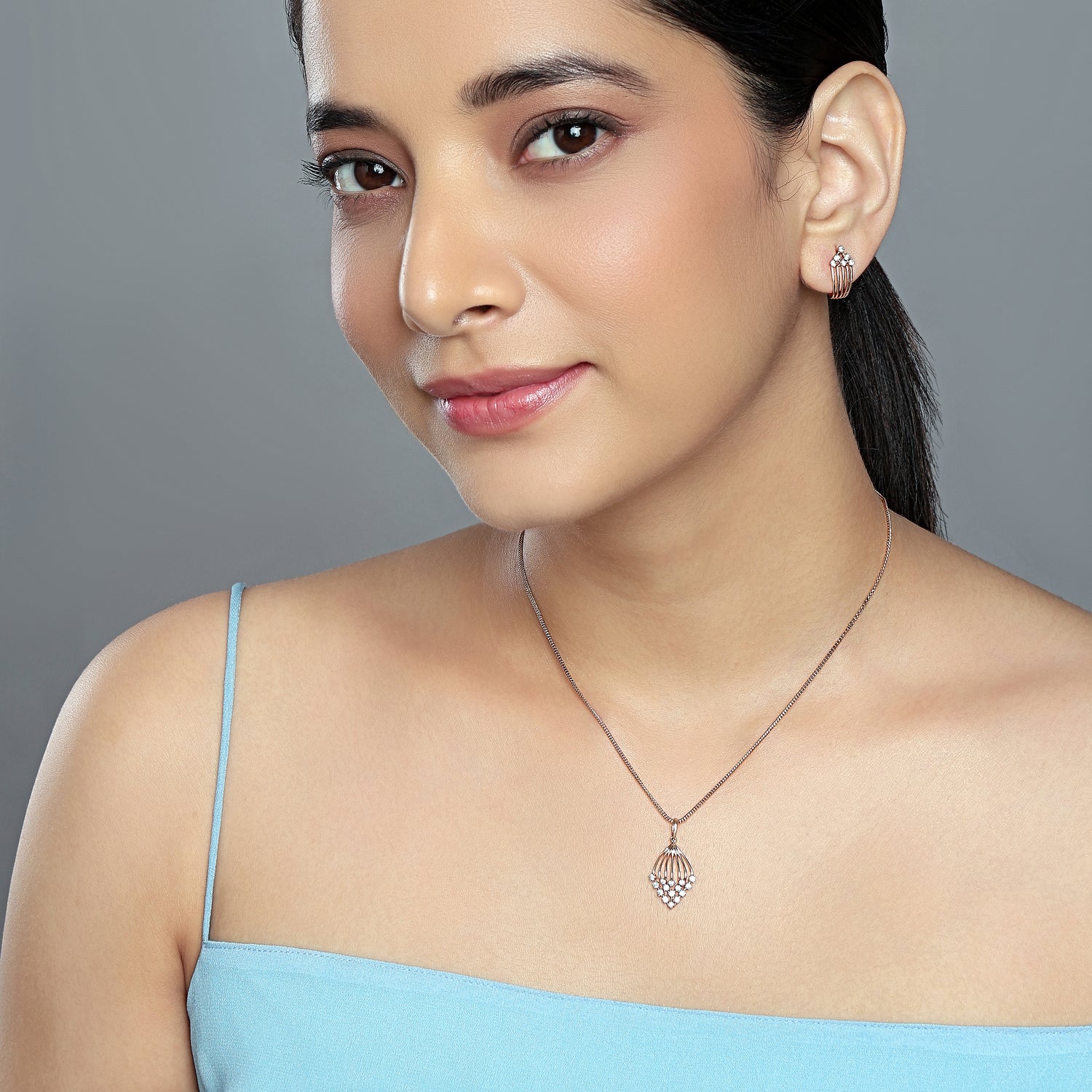 Radiant Cascading Tapered Pendant and Coordinated Stud Earring Jewelry Set