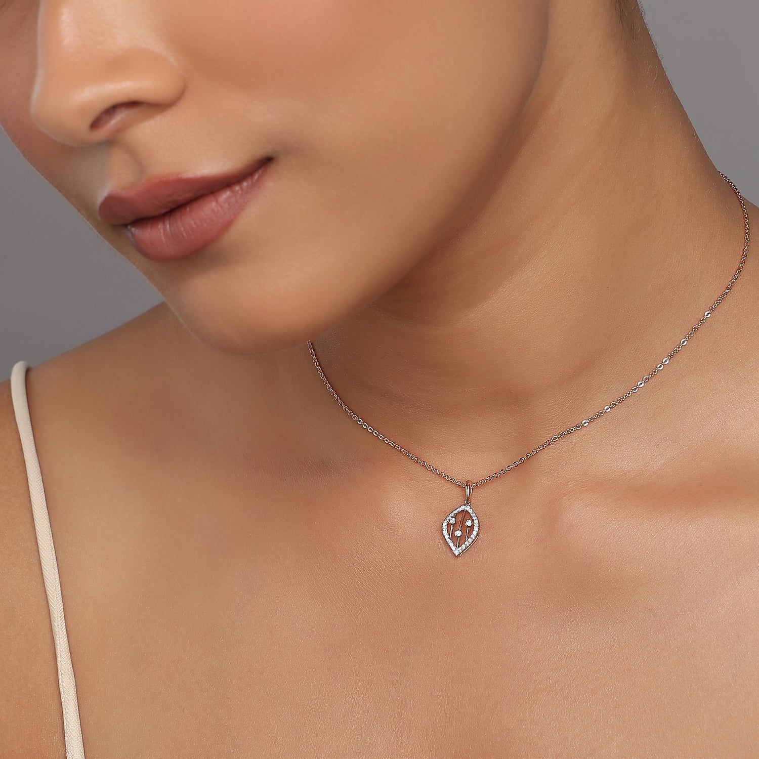 Elegant Marquise Filigree Pendant With Radiant Triple Stone Accents