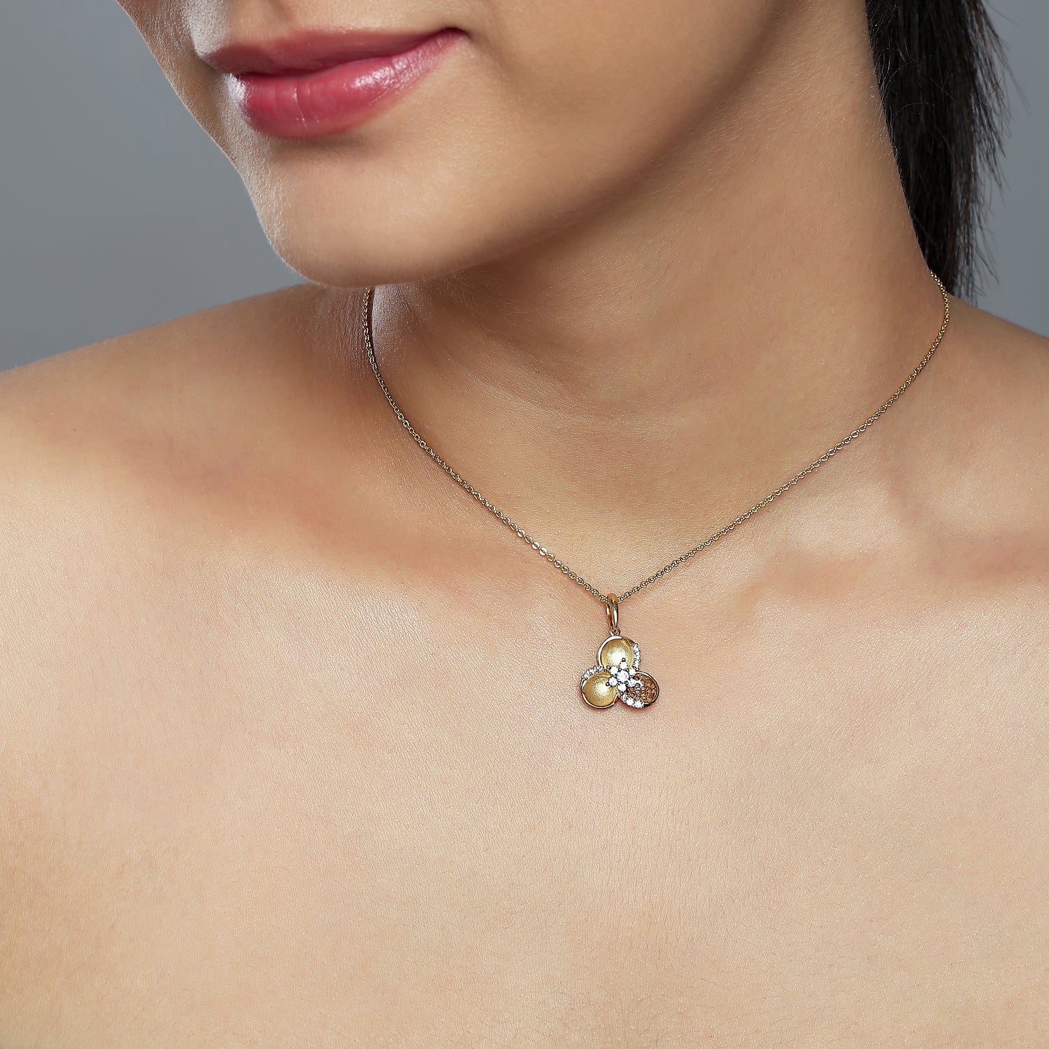 A Playful Trio Medallion Pendant with Contemporary Charm