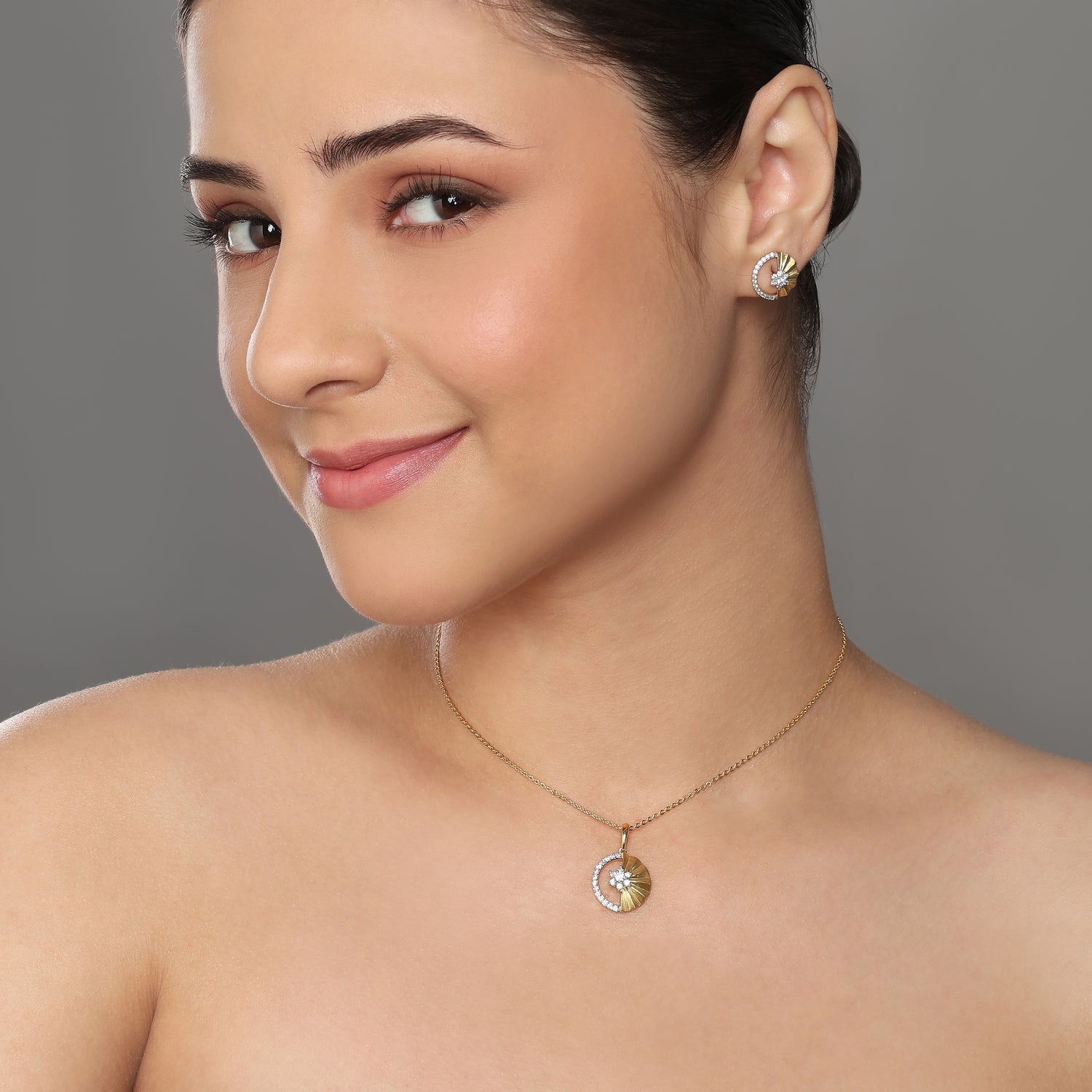 Radiant Celestial Starburst Medallion Pendant and Stud Earring Set