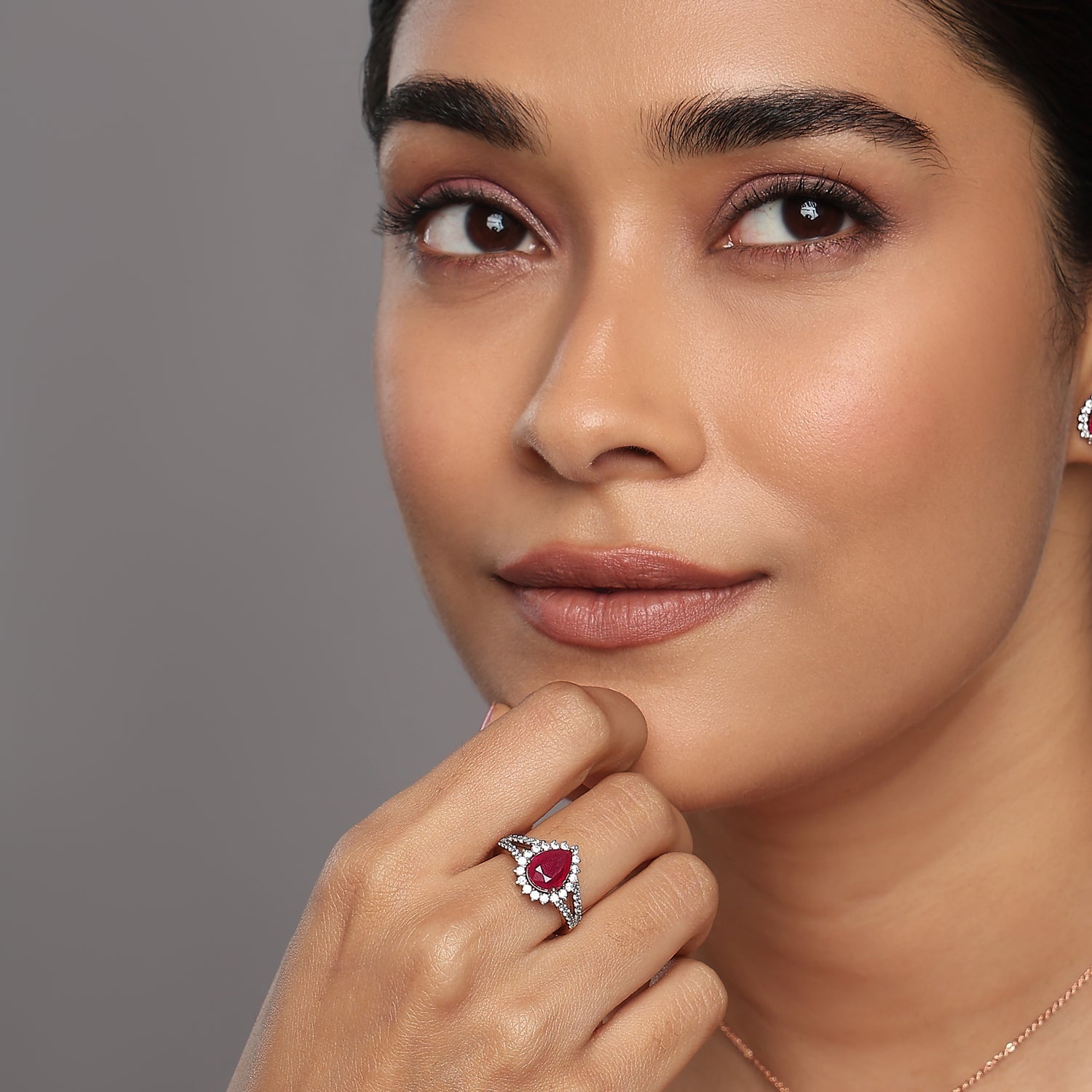 Radiant Pear Cut Crimson Gemstone Statement Ring With Diamond Accents