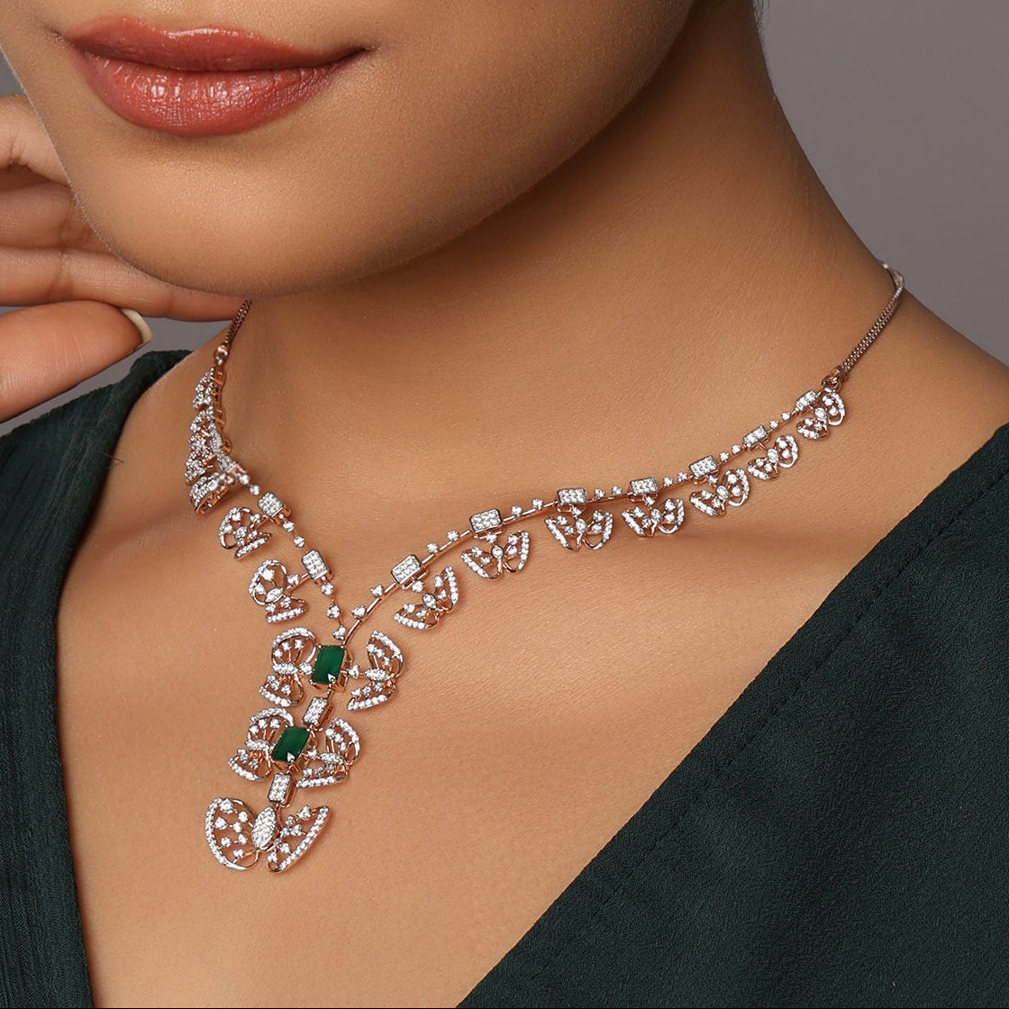 V-Shaped Necklace with Dual Floral Motifs and Layered Detailing