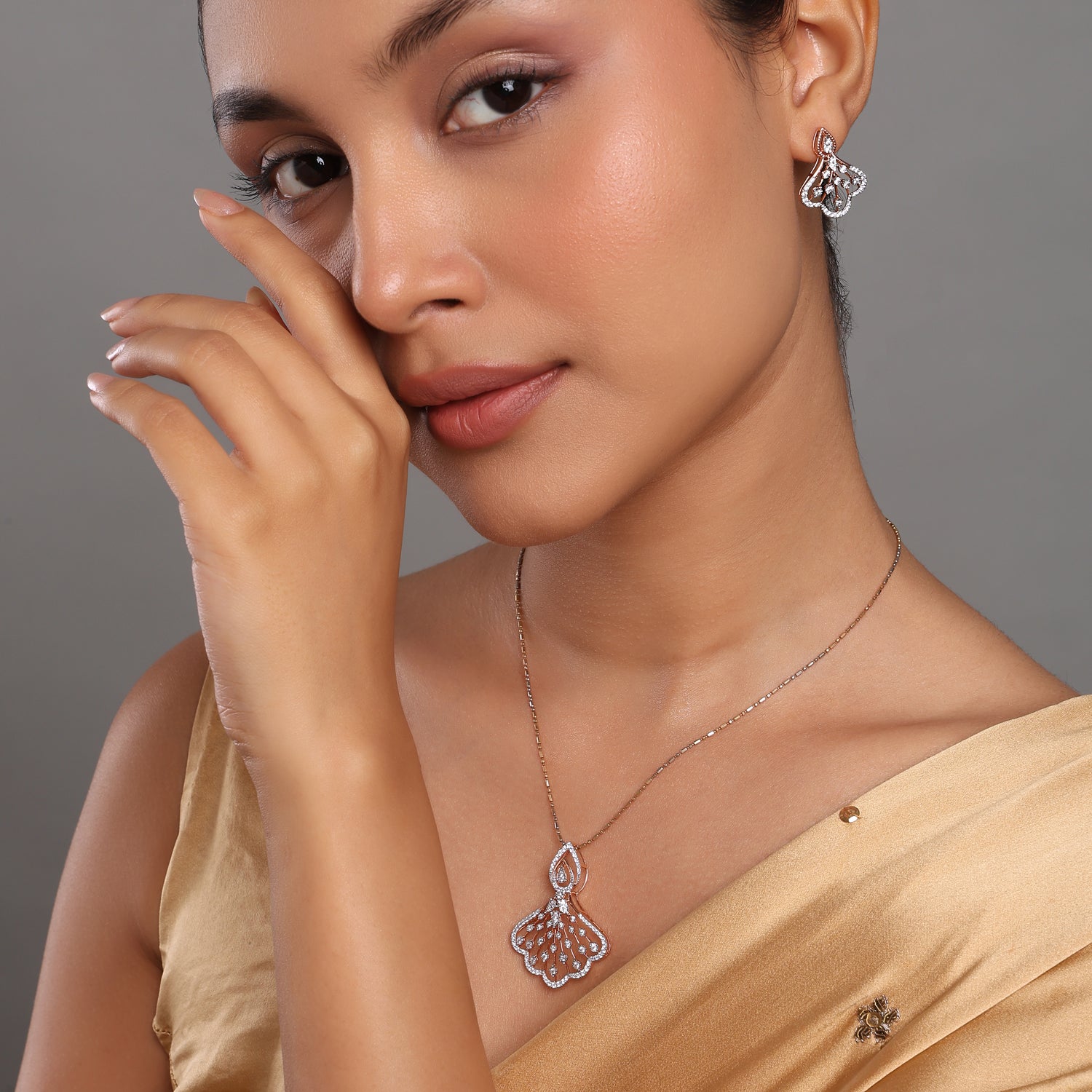 Graceful Teardrop Motif Pendant and Earring Set with Flowing Openwork
