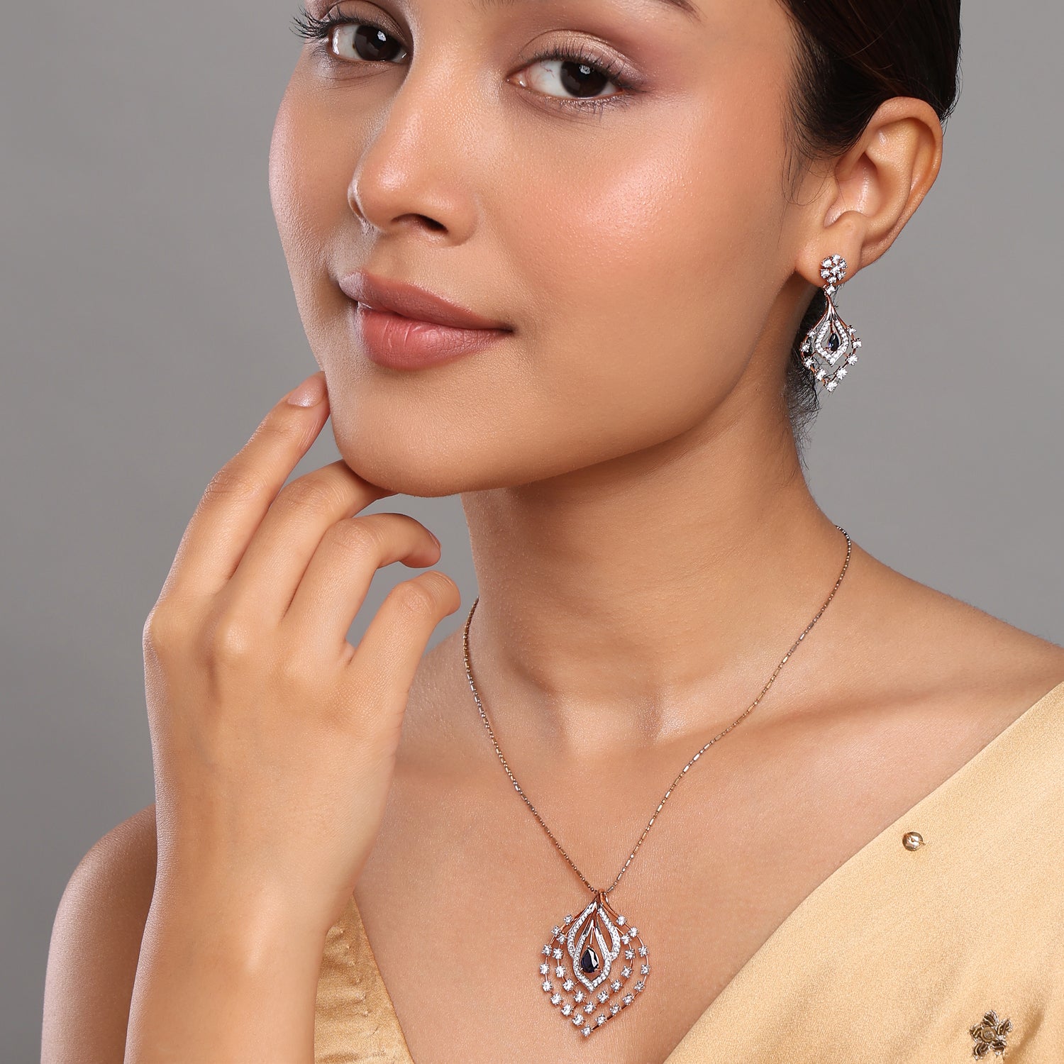 Royal Drop Pendant and Earring Set with Graceful Detailing