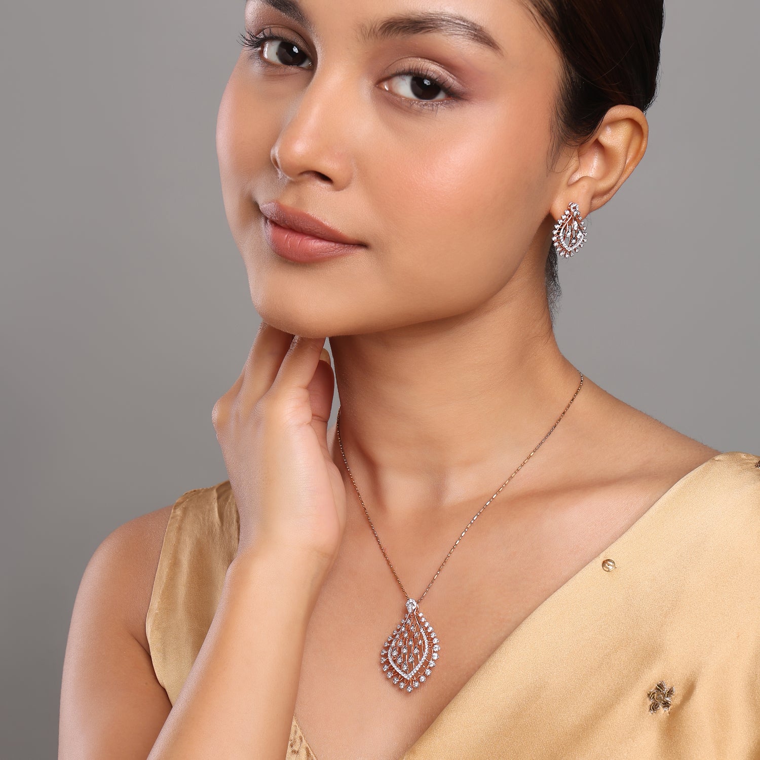 Elegant Pear Silhouette Necklace and Earring Set with Graceful Detailing