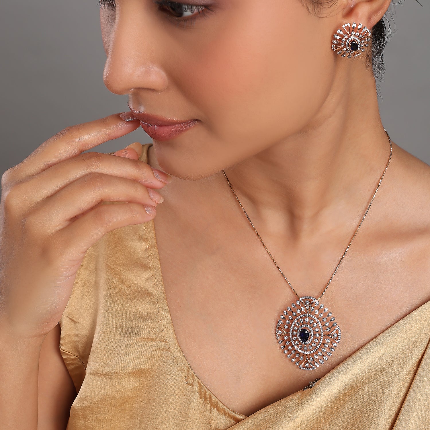 Radiant Sunburst Motif Necklace and Earring Set with Ornate Detailing