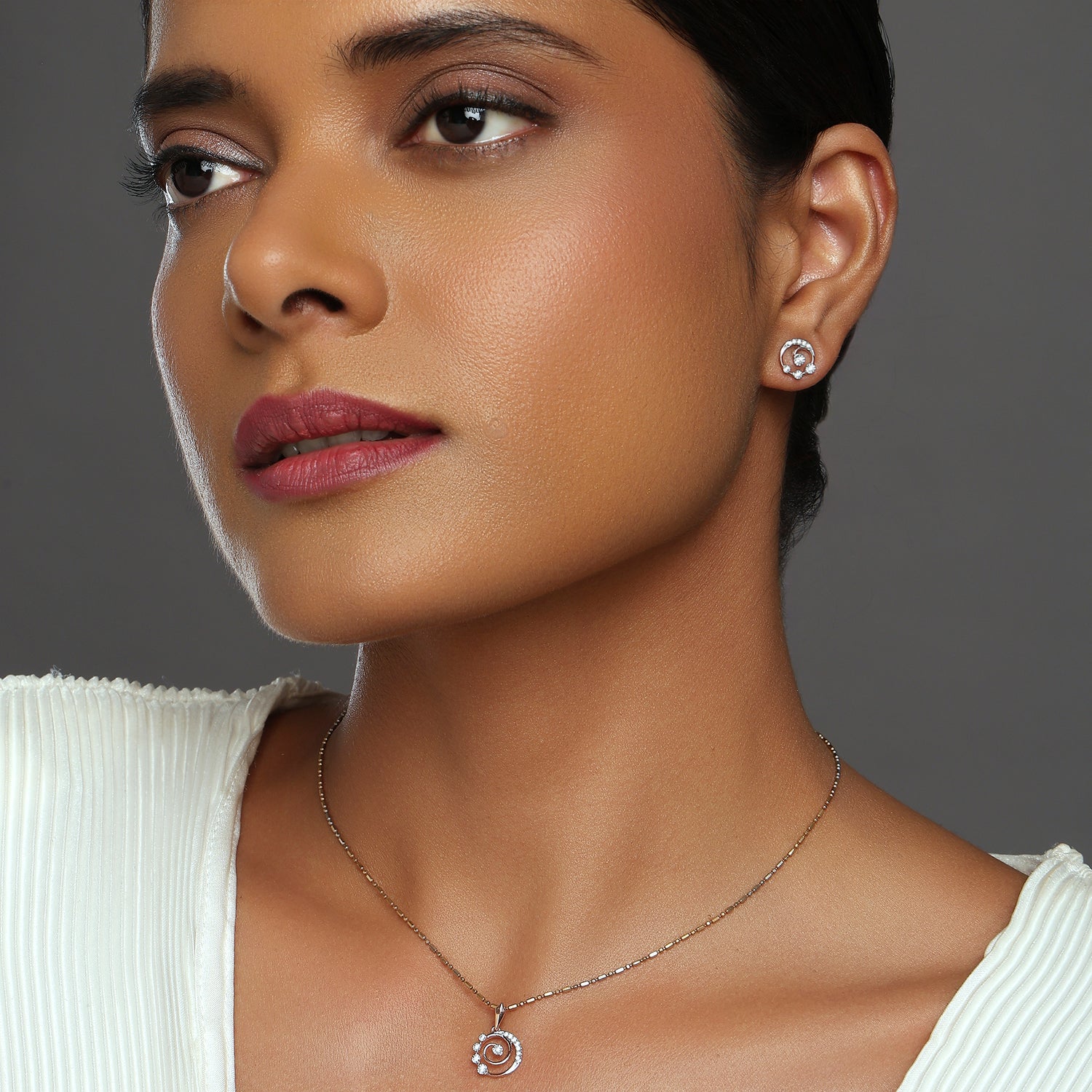 Celestial Swirl Pendant and Earring Set with Modern Grace
